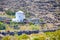 Classical Round Greek Mills Houses on Santorini Island on Caldera Mountains