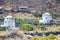 Classical Round Greek Wind Mill Houses on Santorini Island on Caldera Mountains