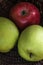 Classical still life photograph of apples in wooden basket