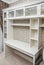 Classical style bookcase with glass doors and writing desk