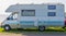 Classical white camper, Mobile home for the holidays and travel, recreational automobile