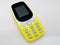 Classical yellow mobile phone. Communication concept. o