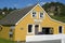 Classical yellow scandinavian wooden house in norway