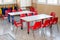 Classroom nursery with chairs and desks for children