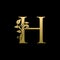 Classy Gold Leaf H Letter Logo