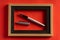 Classy silver pen against red background