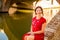 Classy woman sitting on bridge