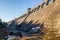 Clatteringshaws Dam on the Blackwater of Dee, in the winter sun in Scotland