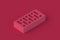 Clay brick of magenta on red background. Color of the year 2023