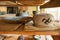 clay crafts pottery studio wood table traditional potter work warm color.