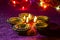 Clay diya lamps lit during Diwali Celebration. Greetings Card De