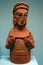 Clay female figure with jewelry