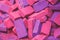 Clay handmade bricks. Bright magenta purple colored