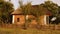 Clay hut with straw roof.