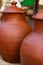 Clay jug brown large traditional container oil storage wine close-up