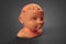 Clay model of the child`s head and brain