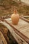 Clay Pitcher On Wooden Cartload Outdoors