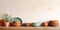 Clay plate and bowls on kitchen countertop and shelf with pottery above it. Close up background of interior design of kitchen