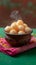 Clay pot charm Rasgulla, the iconic Bengali sweet, beautifully presented