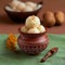 Clay pot charm Rasgulla, the iconic Bengali sweet, beautifully presented