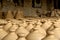 Clay pots drying in pottery shop
