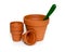 Clay pots and green shovel