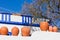 Clay pots stand on white pottery wall in Portugal