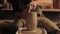 Clay pottery handmade manufacturing man hands vase