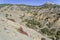 Clay ravines at the foot of the mountains