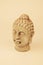 Clay reproduction of a Buddha head for display or decoration