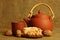 Clay teapot with sweets