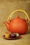 Clay teapot with sweets