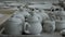 Clay workshop. Billets of teapots for welding, sugar bowl. Panorama.