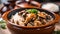 Claypot chicken and rice with mushroom on top