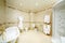 Clean bathroom with bath, shower cabin, toilet and bidet