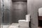 Clean and black bathroom with amenities in house