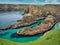 The clean, clear water and eroded coastline of north Shetland at the island of Uyea in north Mainland, Shetland, Scotland, UK