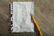 Clean crumpled sheet with pencil