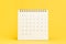 Clean desktop calendar with date 31 days on solid yellow background using as schedule planning, deadline to launch project or