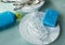 Clean dishes in foam detergent for washing dishes, blue sponge