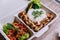 Clean food meal box: Rice with diced chicken served with tomato salad, pumpkin, broccoli and Coriander