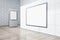 Clean gallery interior with wooden flooring, empty white mock up posters on concrete wall. Museum concept.