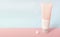 Clean label facial or body cream tube and product squeezed cream texture is isolated on a pink background. Banner for