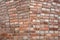 Clean masonry work in an old brick wall, as a patterned and weathered background