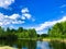 Clean river and summer sky with clouds.