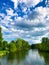 Clean river and summer sky with clouds.