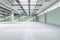 Clean spacious concrete warehouse garage interior. Space and design concept.