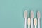 Clean toothbrushes laid out on the background for inscription text about oral hygiene