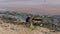 Clean Up Ocean Beach. Plastic Pollution As Ecological Problem. Young Woman And Boy Picking Up Garbage And Solid Waste