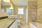 Clean and warm bathroom interior with marble tile
